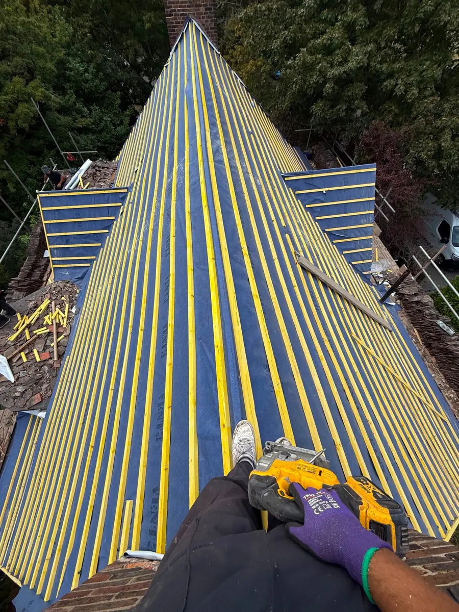 Fixing new battens from the ridge down