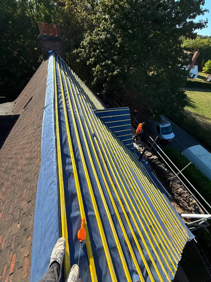 Long run of new battens over breathable membrane