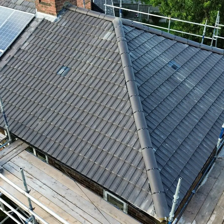 New tiled hip roof finished, looking down from the ridge
