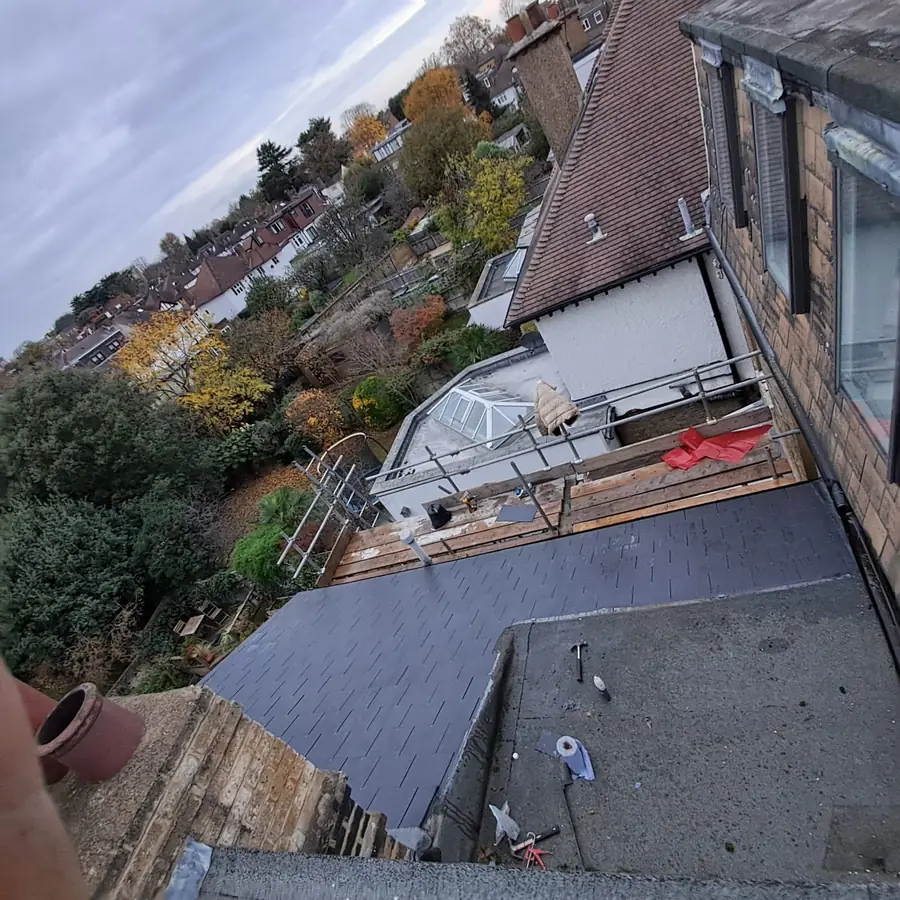 Flat roof on a dormer with gardens below