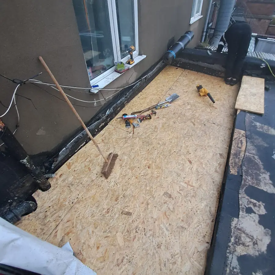 OSB flat roof deck laid to the edge