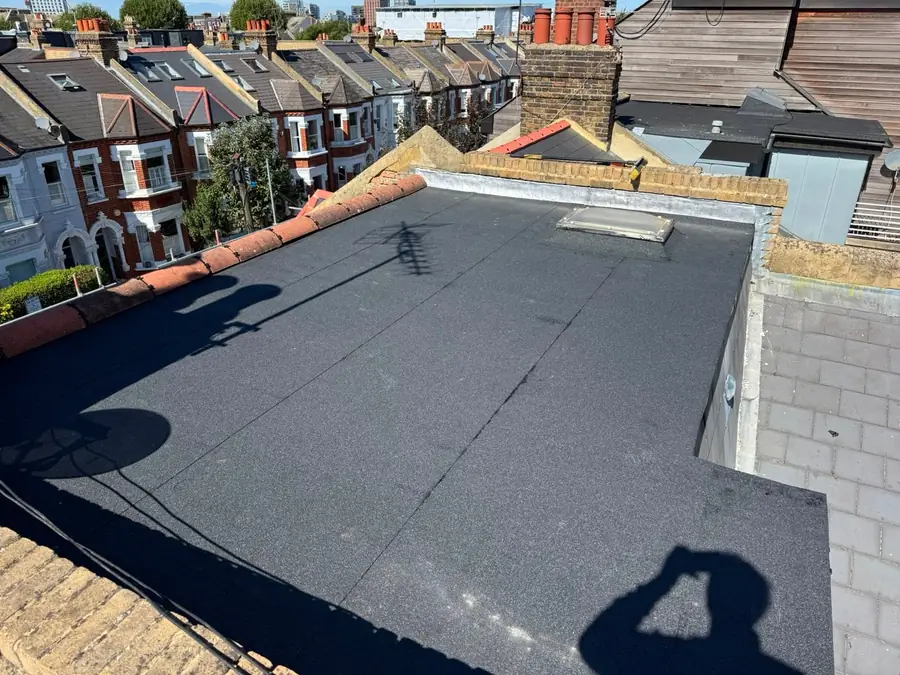 New felt flat roof looking over a street of terraces