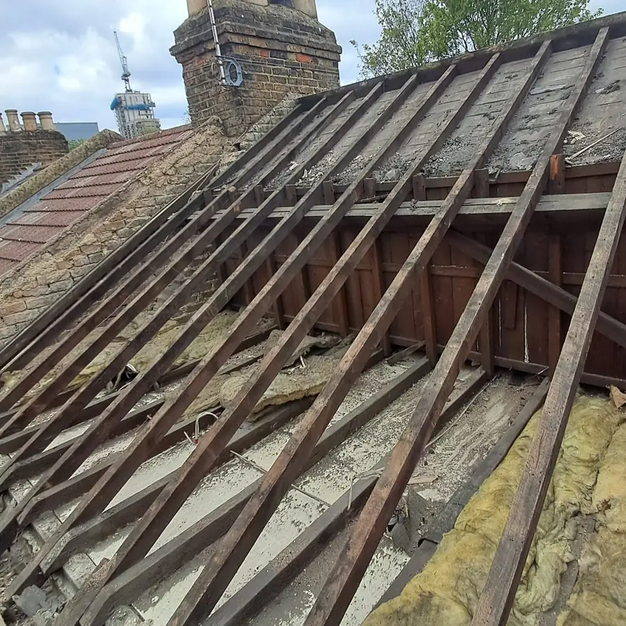 Rafters exposed on a terrace roof during a re-roof