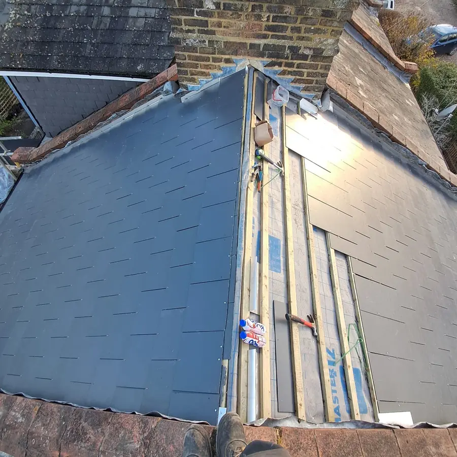 Slate roof and dormer cheek finished