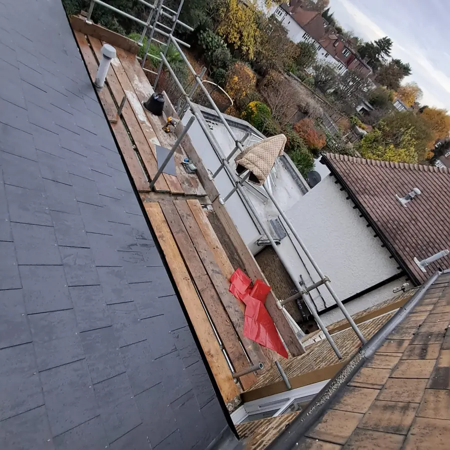Slate roof slope finished along a gable