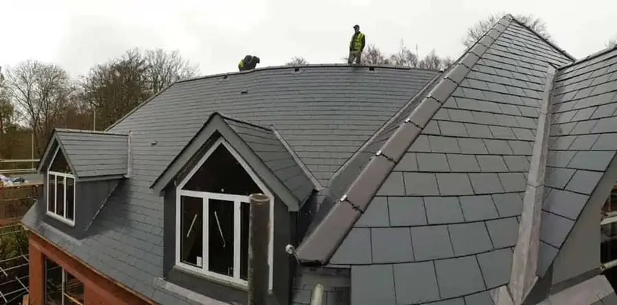 Slate roof with dormer windows finished