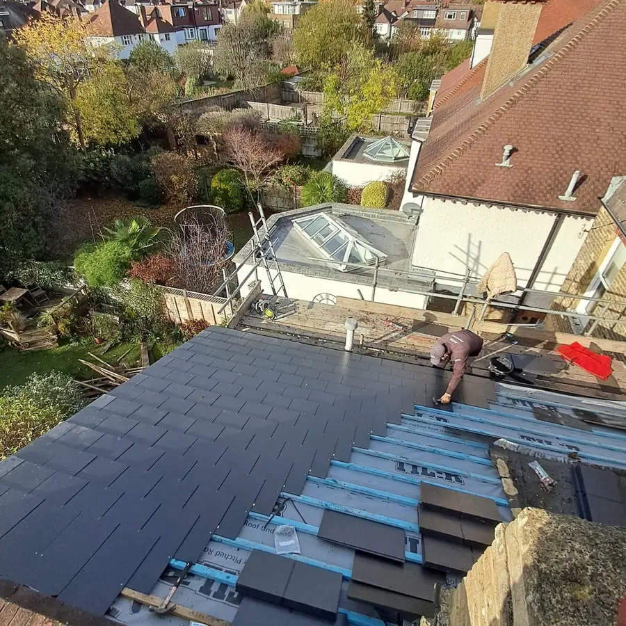 New slates going on over membrane and battens