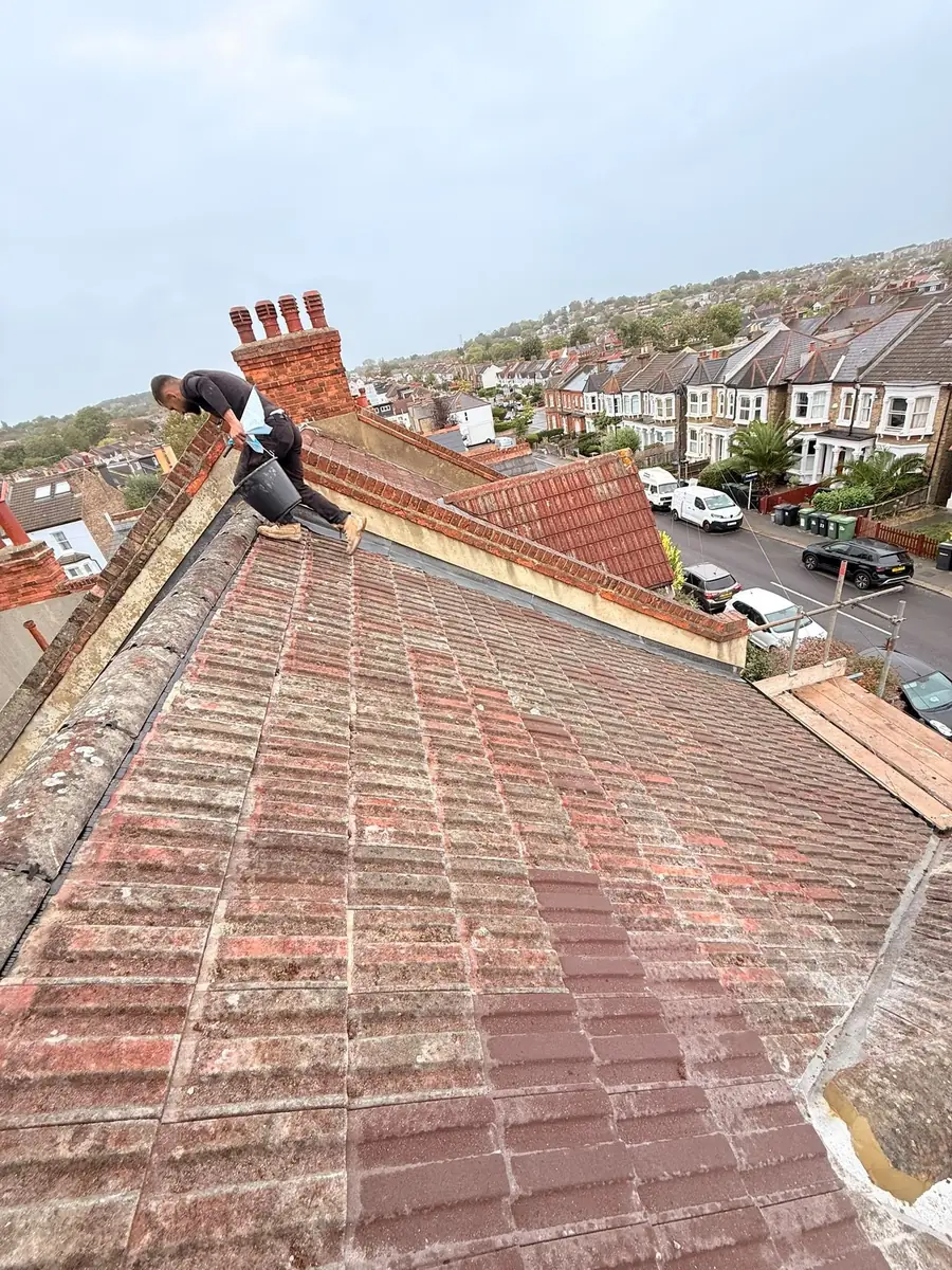 Old ridge and tiles on a terrace roof before work